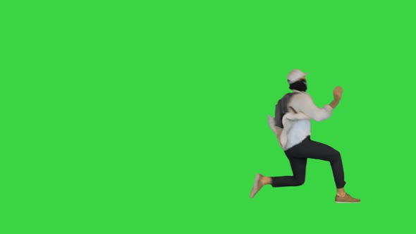 Bully Demonstrator Running and Getting a Shot in the Back on a Green Screen Chroma Key alt