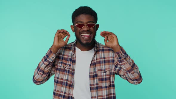 crazy-man-in-fashion-shirt-demonstrating-tongue-out-fooling-around