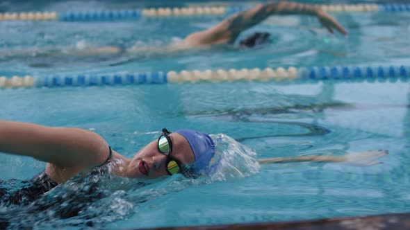 Man and Woman Competing in Pool alt