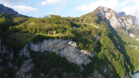 Aerial video of the Swiss Alps and Walensee Lake in Switzerland during Summer (1) alt