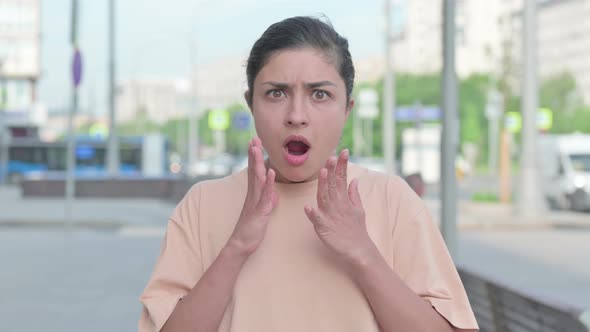 Portrait of Disappointed Indian Woman Reacting to Loss alt