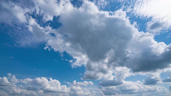 Air Plane Window View Time Lapse Clouds and Blue Sunny Sky Loop of White Clouds Over Blue Sky with alt