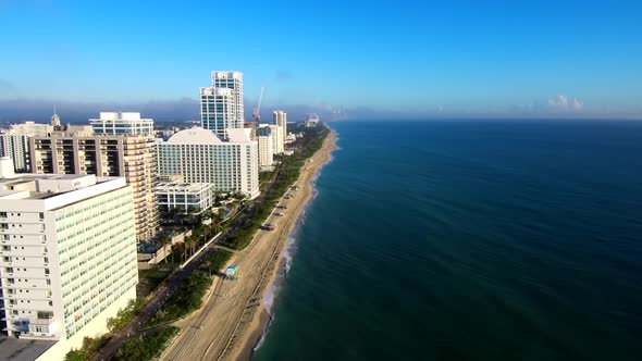 Aerial Footage above the sea viewing the Miami beach
