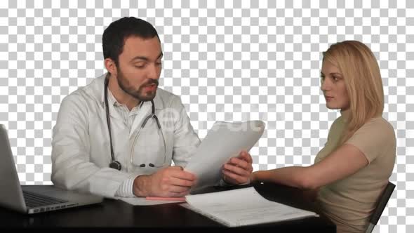 Doctor and patient discussing - visit in the office, Alpha Channel