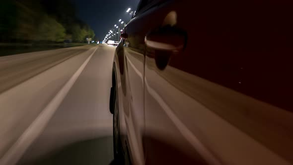 Drivelapse From Side of Car Moving on a Night Highway Timelapse Hyperlapse alt