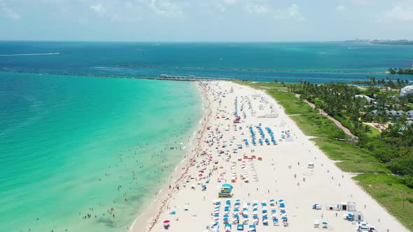 Cinematic Aerial of the Tropical Beach at the Coastal City Green Atlantic Ocean alt