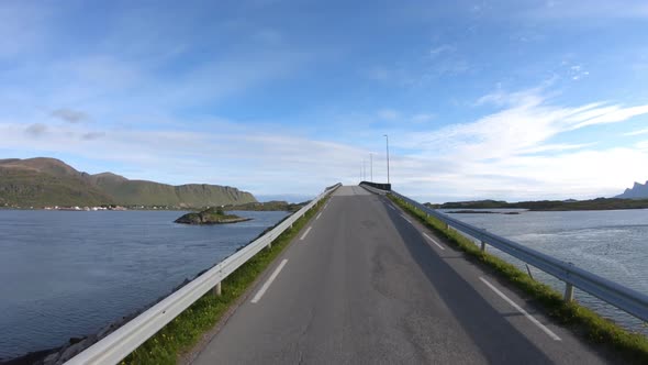 Driving a Car on a Road in Norway Lofoten alt