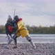 Two armored medieval knights fighting with swords Medieval Europe Crusaders Historical Reenactment - VideoHive Item for Sale