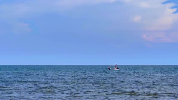 Small fishing boat on sea alt