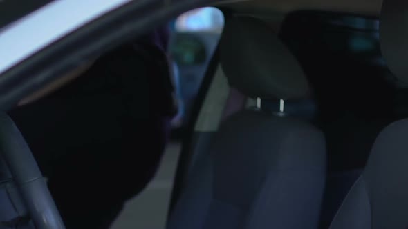 Duty Police Officers Getting in Patrol Car, Ready to Drive to Crime Scene alt