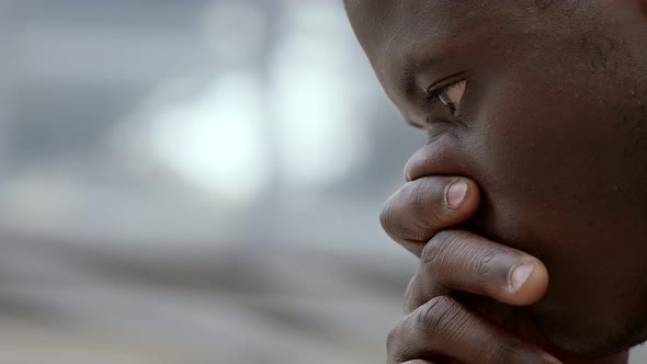 find solutions, reasoning. thoughtful black african businessman thinking alt