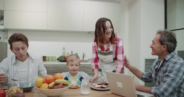 Attractive Mature Woman Brings the Food in the alt