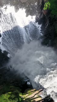 Waterfall in South America Colombia Aerial Vertical Top View.