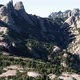 Drone flight over the famous mountain range of Catalonia; sunny winter - VideoHive Item for Sale