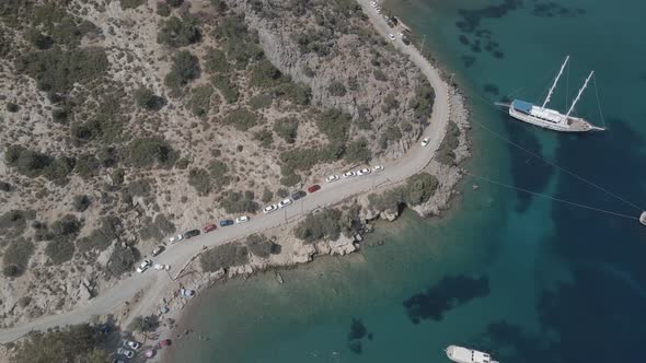 aerial view of a beautiful beach and boats alt