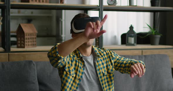 Man Is Impressed By 360 Video Concept, Wearing Vr Headset at Home alt