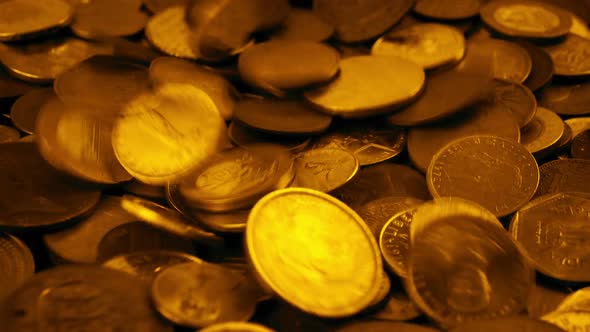 Gold Coins Pour Into Pile - Value Concept alt