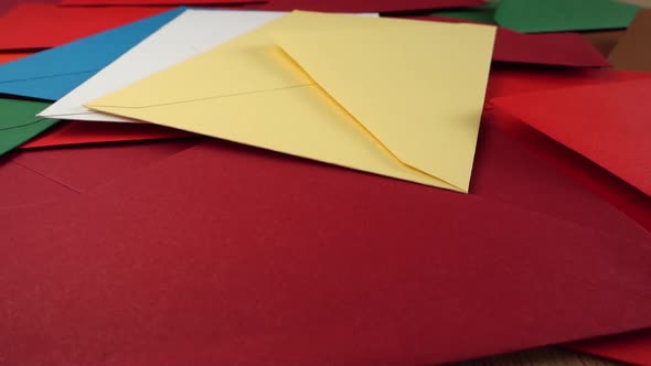 Falling multi-colored envelopes. Slow motion. alt