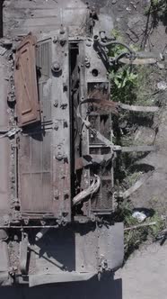 Vertical Video of a Burnt Military Equipment During the War in Ukraine alt