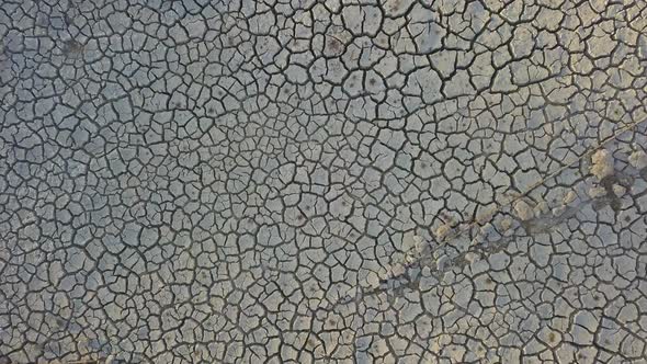 Descend On Cracked Mud Texture Dry Lake Bed