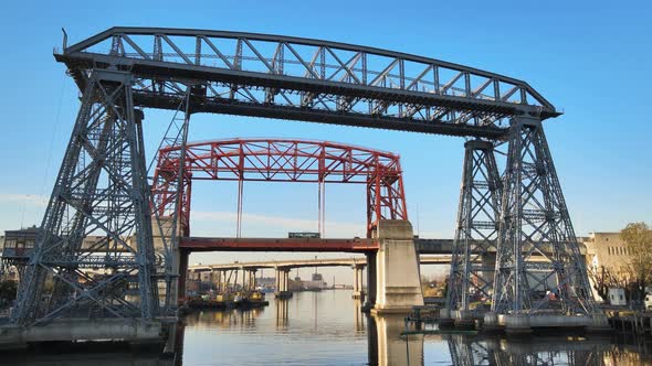Close static view of Puente Transbordador and red bridge, Buenos Aires alt