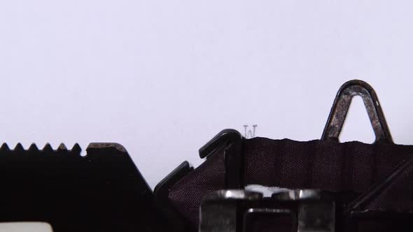 Word Win Printed on a Retro Machine. Close Up alt