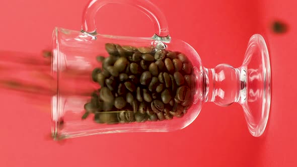 Vertical Video Coffee Beans Quickly Pour Latte Glass Mug Red Background