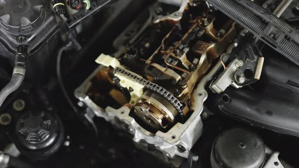 Mechanic Repairing Automobile Motor Using Tool Auto Master Fixing Engine From Vehicle