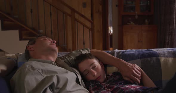 Family spending time together at home in the evening alt