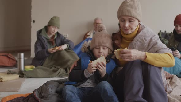 Homeless Mother and Child in Asylum for Refugees alt