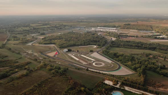 Aerial view of complete Hungaroring race track, overview of the circuit, sunset