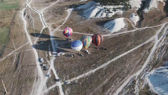 Colored Balloons Getting Ready To Launch Top View. Drone Shooting