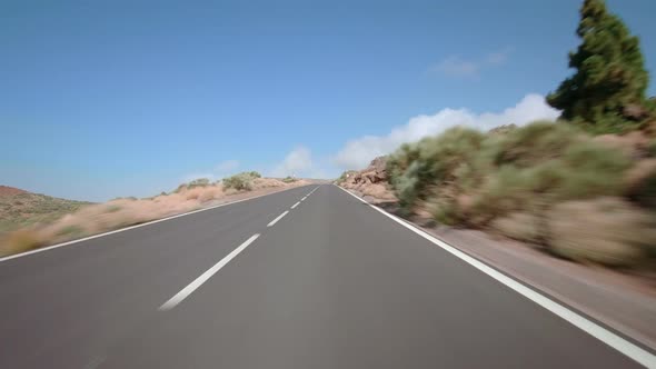 Driving a car with attached action cam in Teide National Park Tenerife alt