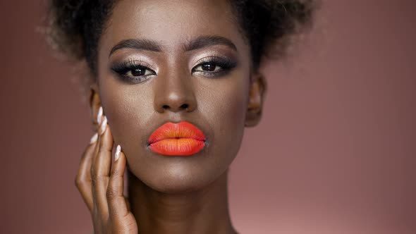 Sensual African American Girl with Colorful Fashion Makeup
