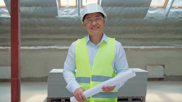 Portrait Korean Architect Professional Real Estate Agent on Construction Site alt