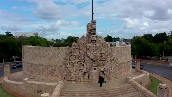 Very slow orbit to left of Monument a la Patria, Homeland Monument showing Police officers lowering alt