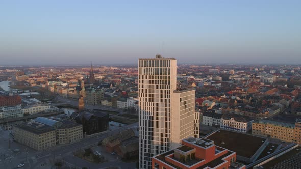 Drone Shot Flying Down by Office Buildings