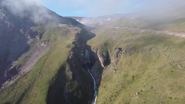 Waterfall Maiden's Spit. Elbrus region. Big waterfall.