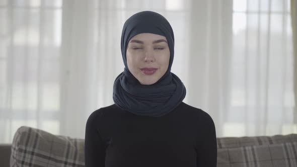 Portrait of Independent Young Muslim Woman Looking Serious Confident at Camera Wearing Traditional alt