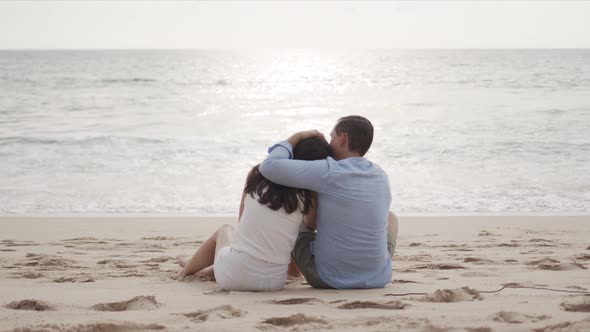 Young Lovers on Honeymoon Hugging at Beautiful Sea Beach alt