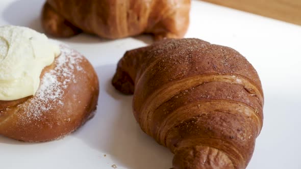 Croissant Lies on a White Background. Baked Goods on Isolated Background alt