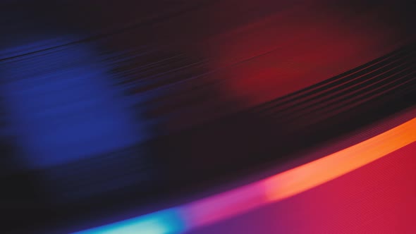 A Vinyl Record Spins in the Gramophone Music Player and Plays an Old Disco alt