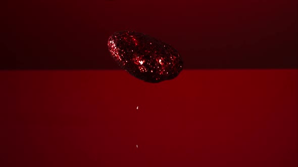 Decorations falling, bouncing in ultra slow mo 1500fps - reflective surface - VALENTINES PHANTOM 004 alt