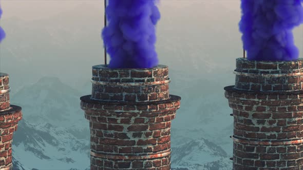 Brick Chimney on the Against the Backdrop of a Snowy Mountain Landscape alt