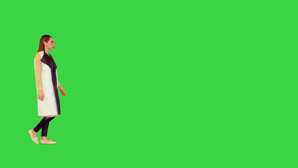 Android Girl Walks Straight Very Slow on a Green Screen Chroma Key