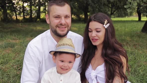 Young Caucasian Family with One Child Spend a Lot of Time Together and Have Fun