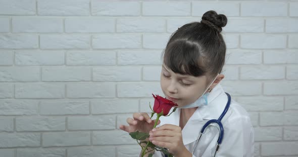 Doctor Work in Pandemic with Flowers alt