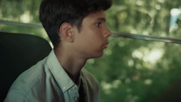 Indian Boy Sitting School Bus Alone Close Up alt