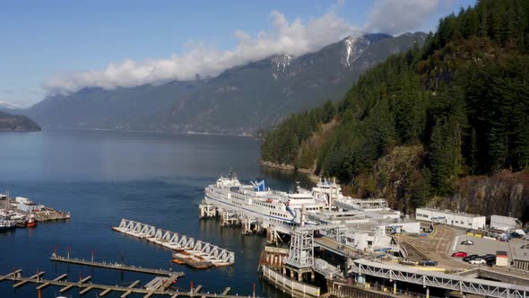 Ferries Docked On Horseshoe Bay With Beautiful Forest Mountains At Background In West Vancouver, Can alt