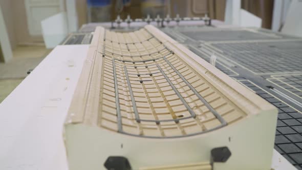 A finished product from furniture for a kitchen set. alt